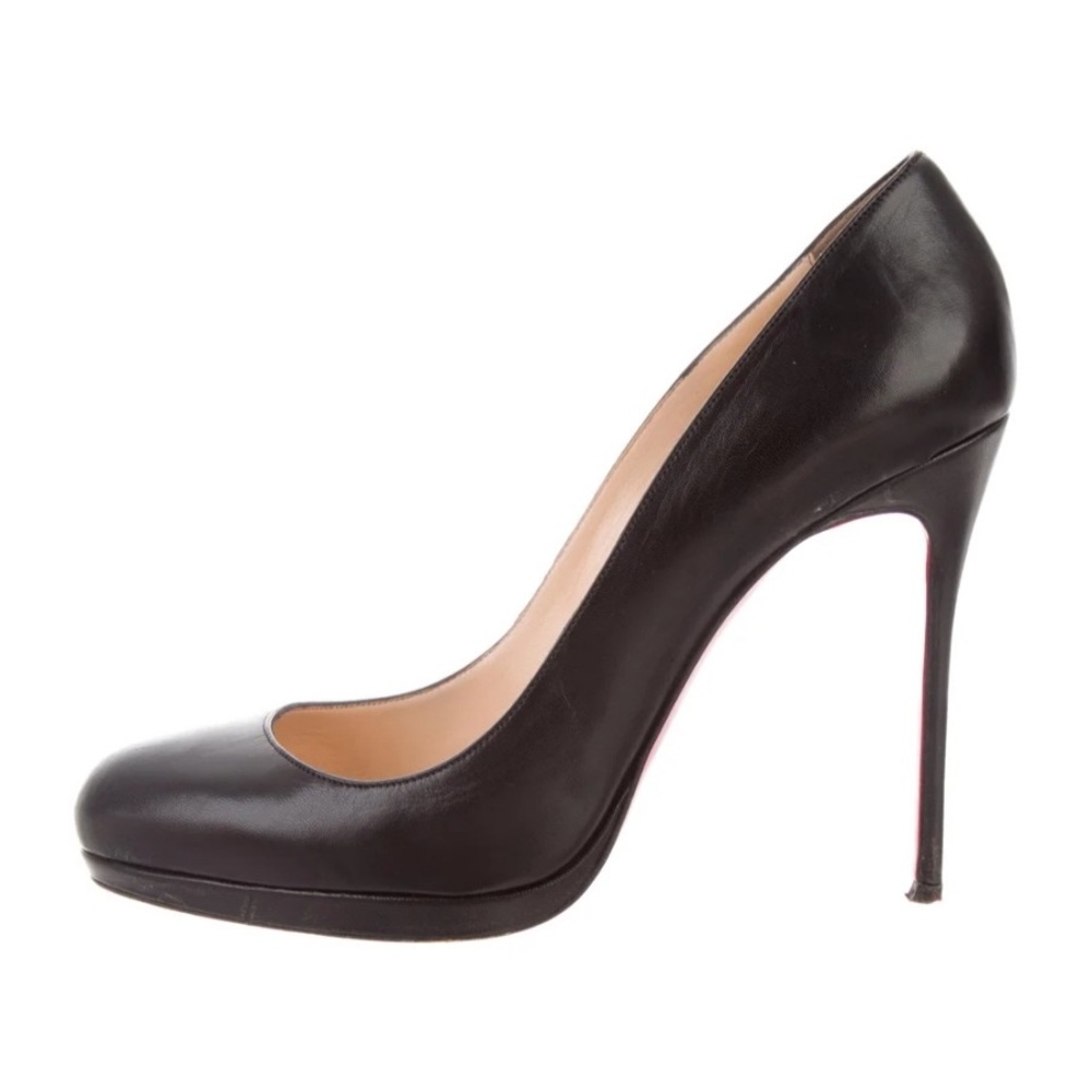 Christian Louboutin 9B runs full size small